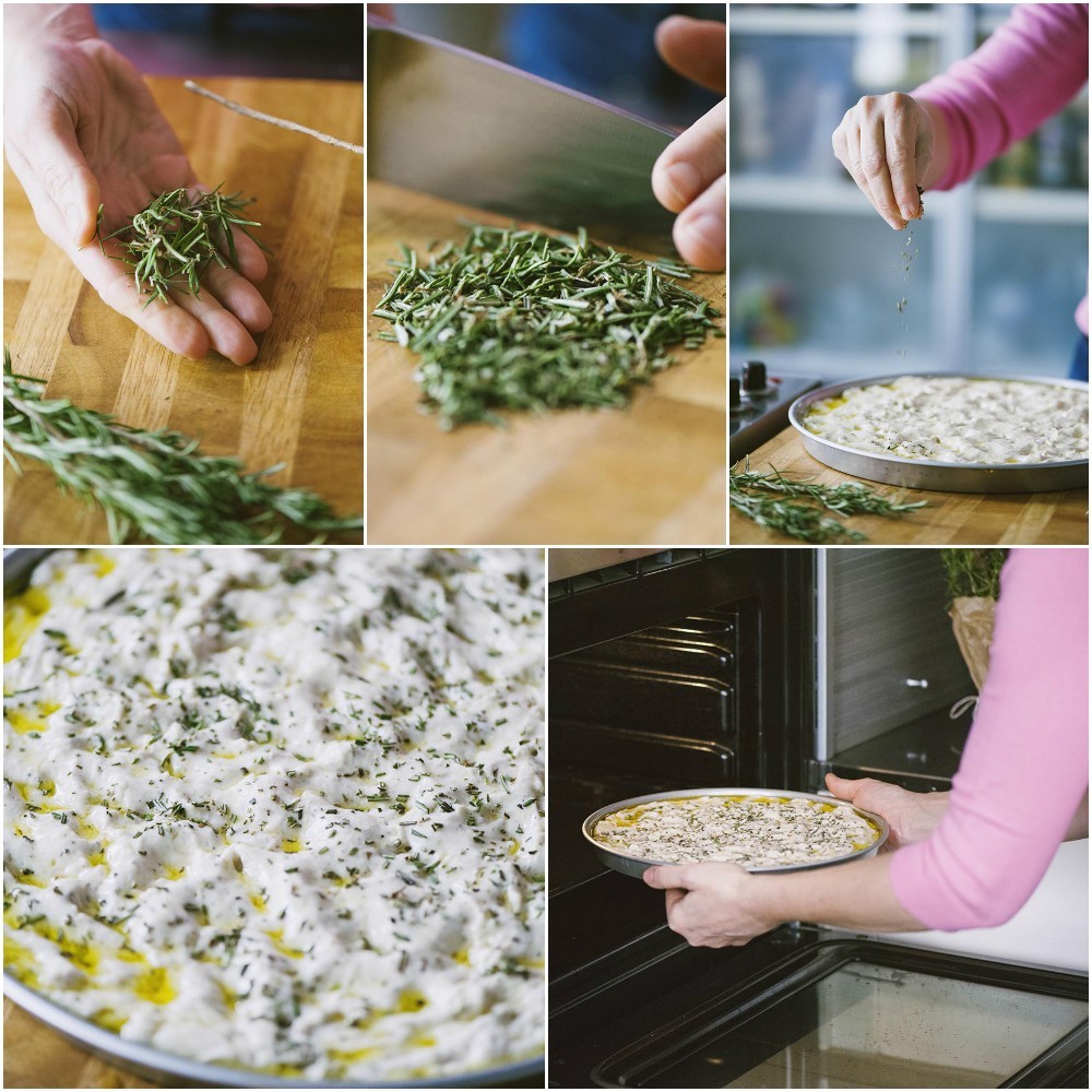 Rosmarino tritato sul tagliere, sparso sulla focaccia cruda con olio, poi infornata