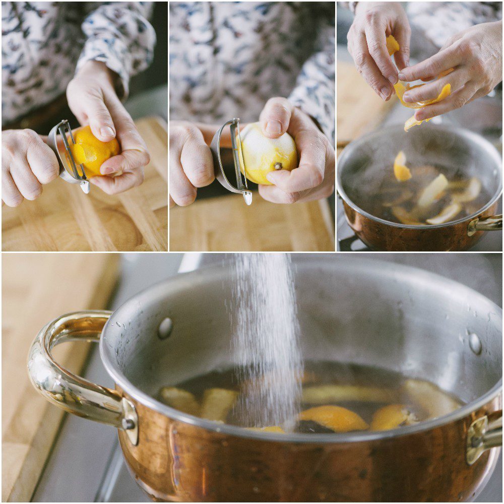 Scorze di limone pelate a mano cadono in pentola con acqua, poi zucchero versato a pioggia