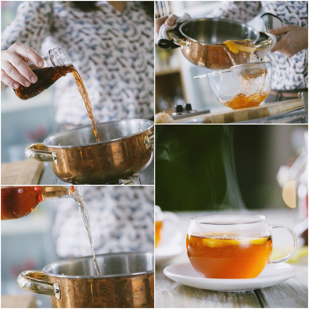 Preparazione dell'English Christmas punch: si versa il liquido, si filtra e si serve fumante con scorza di agrume