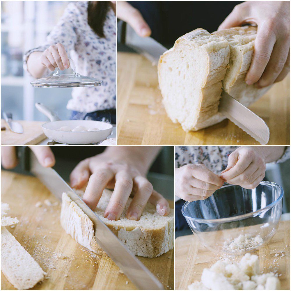 Mani che affettano e sbriciolano la mollica di pane bianco su un tagliere