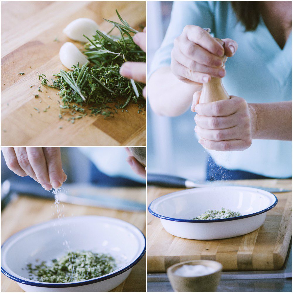 Erbe aromatiche tritate sul tagliere, poi condite con sale e pepe macinato in una ciotola