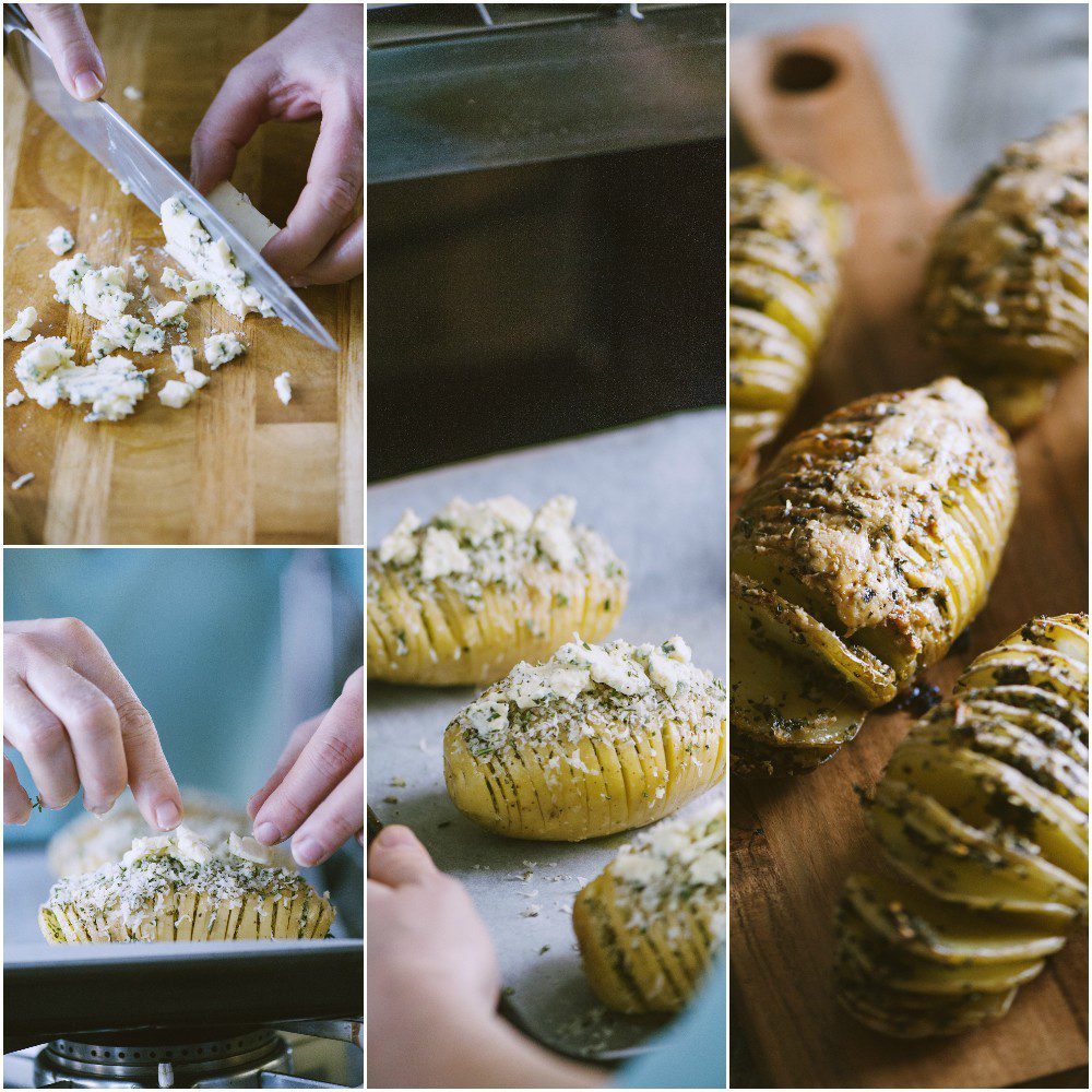 Patate hasselback incise cosparse di formaggio sbriciolato ed erbe aromatiche prima di andare in forno