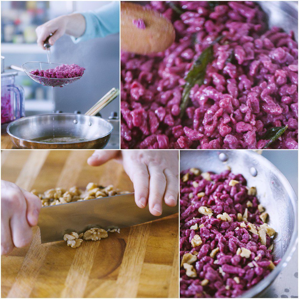 Spätzle alla barbabietola scolati e saltati in padella con noci tritate grossolanamente