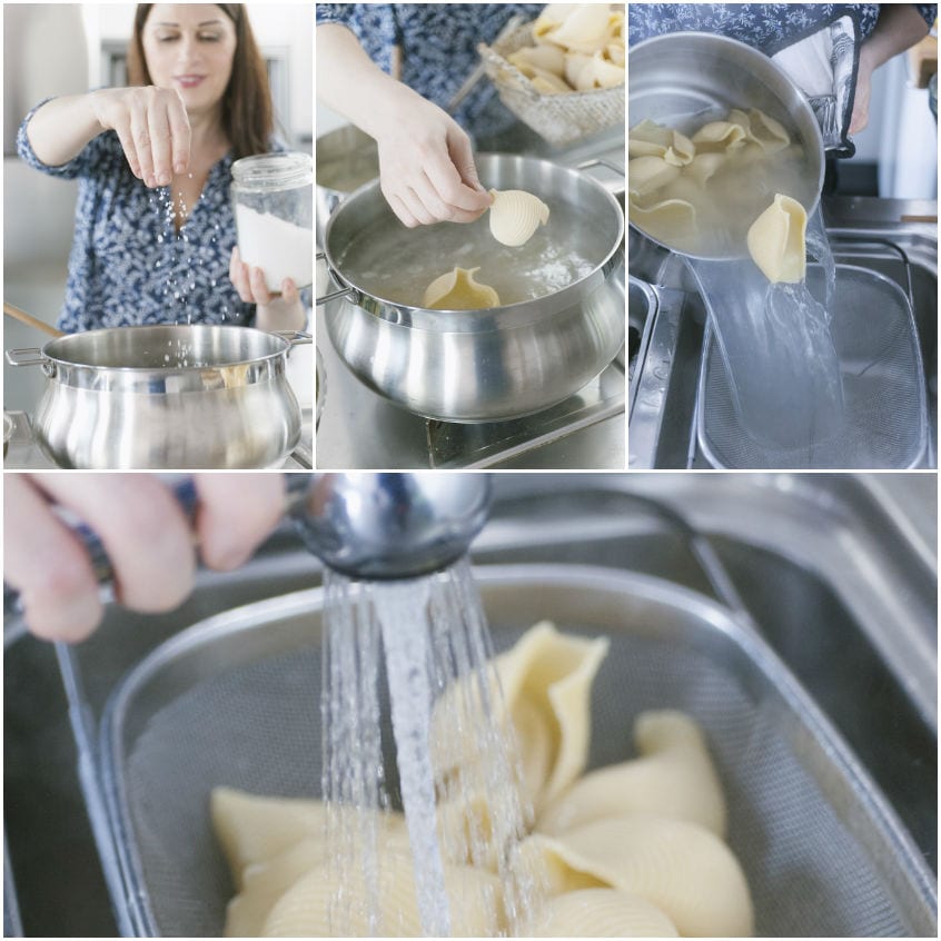 Conchiglioni lessati scolati al dente e raffreddati sotto acqua corrente in un colino