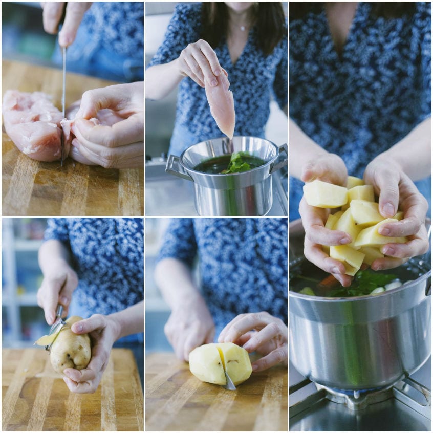 Mani che preparano il brodo: pollo pulito, erbe aromatiche e patate a tocchetti aggiunte in pentola