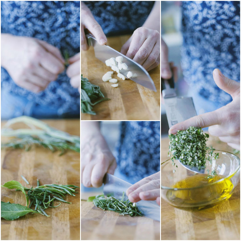Erbe aromatiche tritate con aglio mescolate a olio extravergine in una ciotola per la marinatura