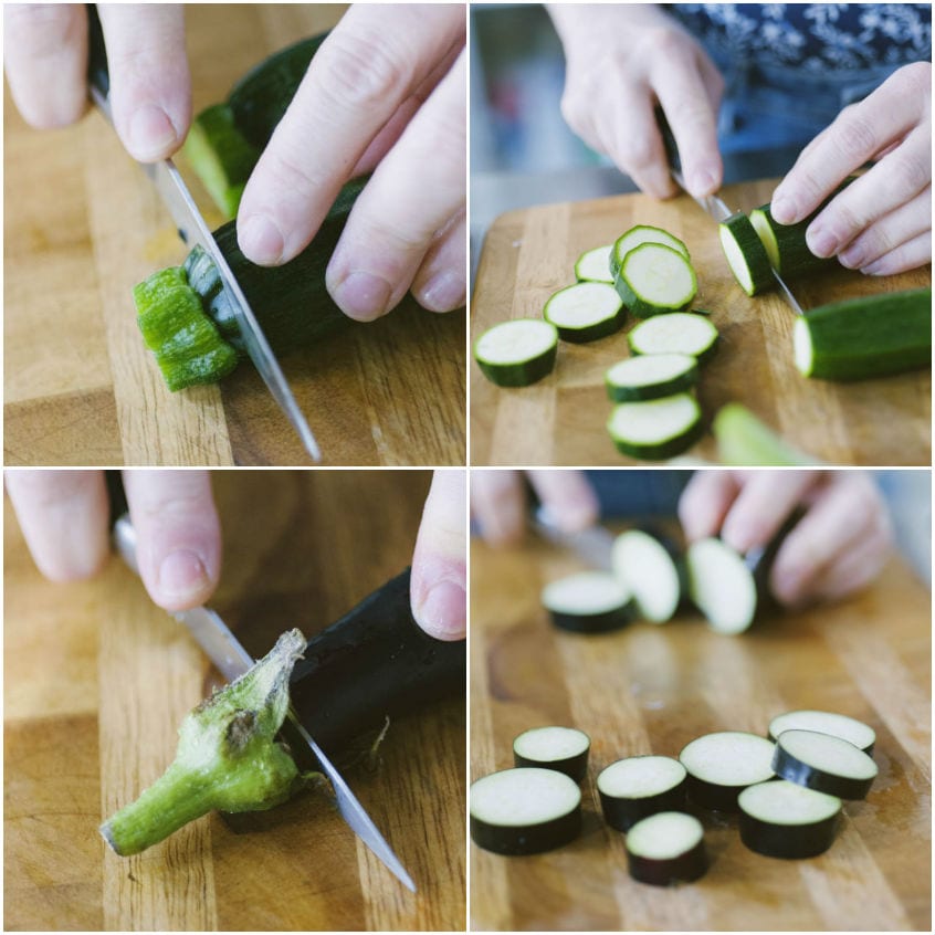 Zucchine e melanzane tagliate a rondelle su un tagliere di legno
