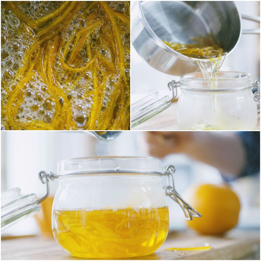 Zeste di limone candite versate con il loro sciroppo dorato in un vasetto ermetico