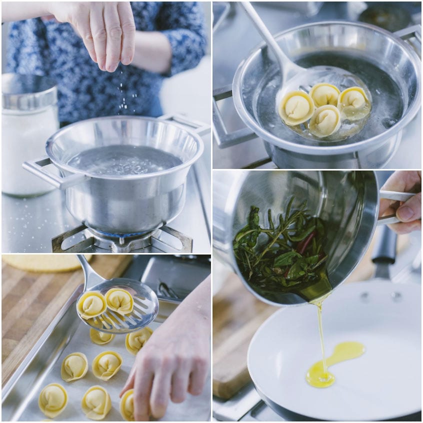 Cappellacci cotti in acqua bollente salata, scolati con schiumarola e impiattati con olio aromatizzato alle erbe