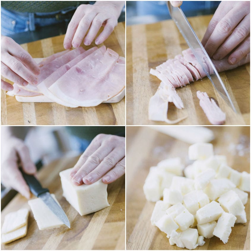 Prosciutto cotto tagliato a listarelle e taleggio ridotto in dadolata sul tagliere