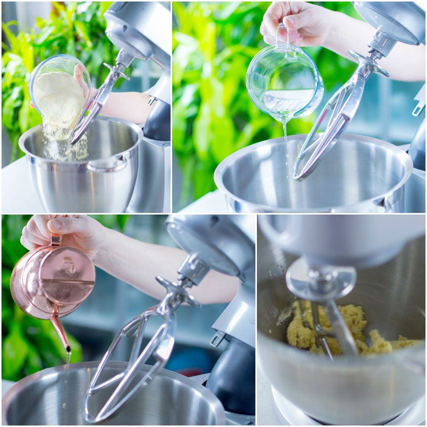 Farina, acqua e olio versati in planetaria per impastare la pasta di semola