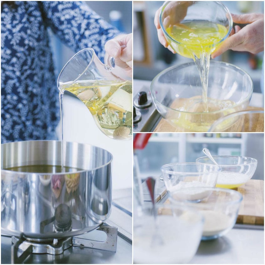 Olio versato in pentola sul fuoco e ingredienti per la panatura preparati in ciotole separate