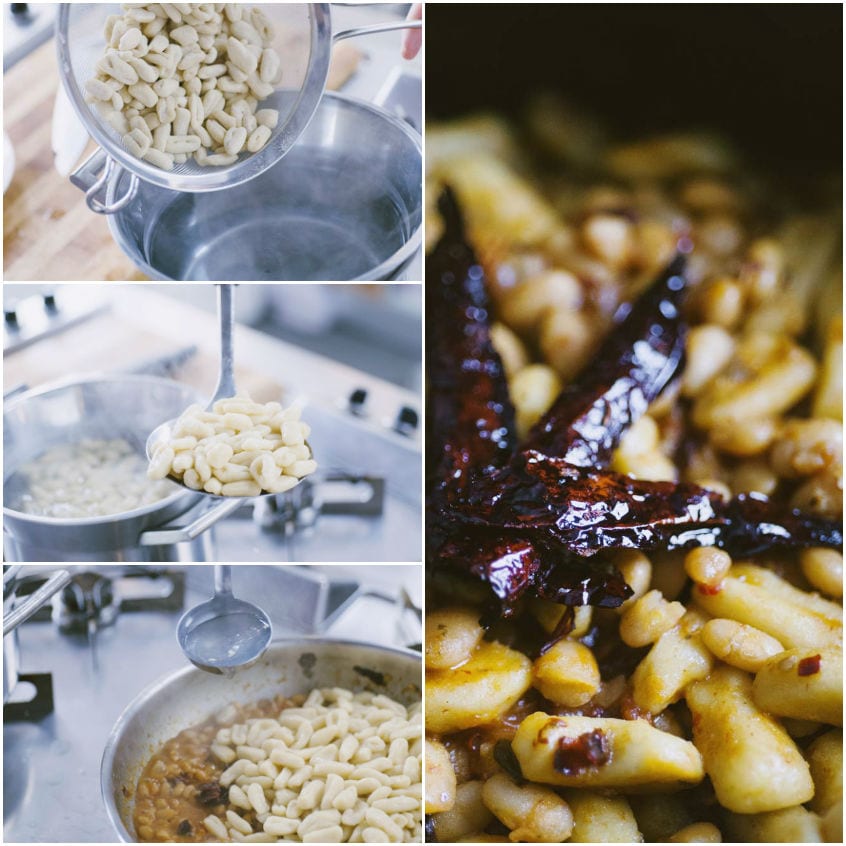 Cavatelli scolati con schiumarola e mantecati in padella con peperoni cruschi dorati