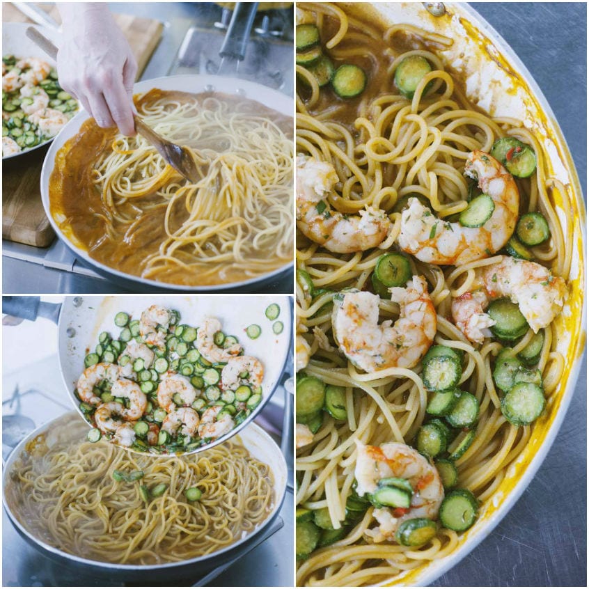 Spaghetti mantecati nella bisque con gamberi saltati e rondelle di zucchine aggiunte a fine cottura