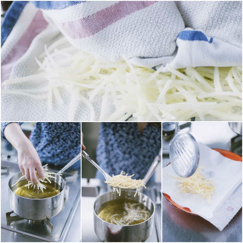 Patate julienne scolate nell'olio caldo e poi sgrondare su carta assorbente