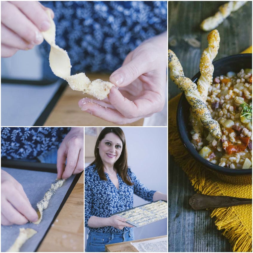 Mani che attorcigliano strisce di pasta sfoglia con semi per formare grissini crudi
