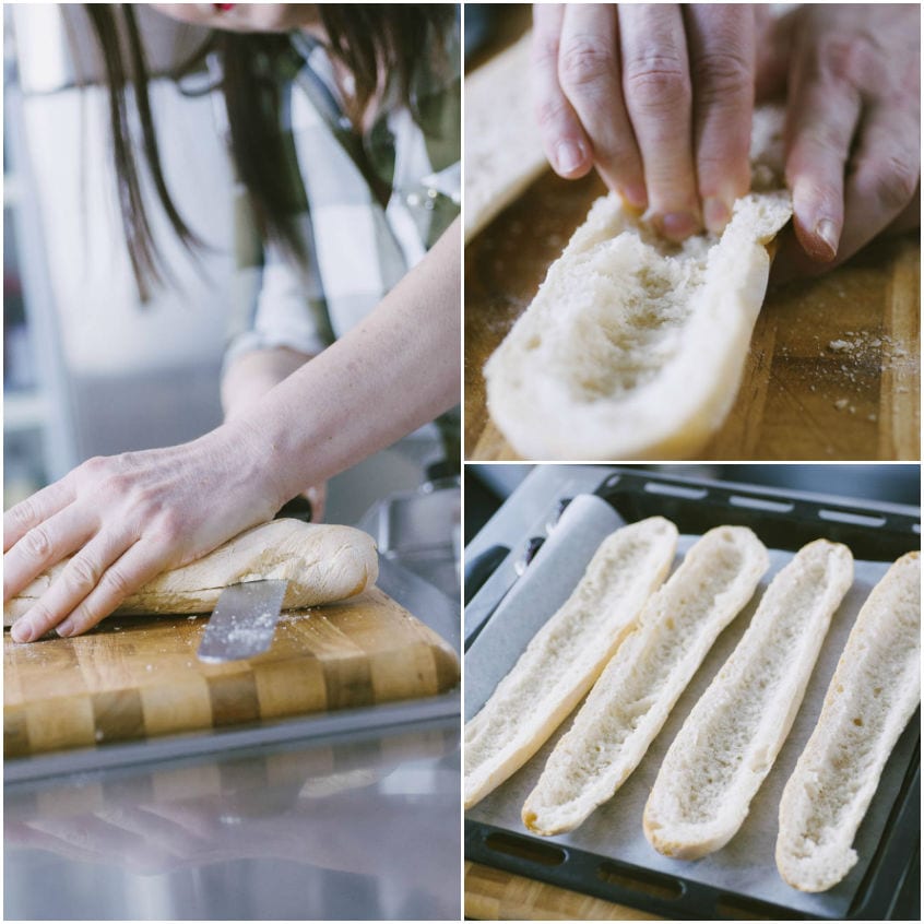 Baguette tagliate per il lungo e svuotate della mollica, pronte su una teglia