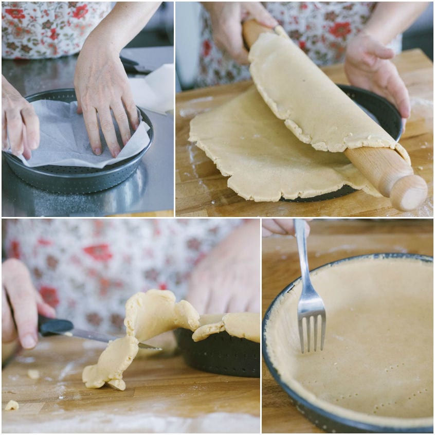 Pasta frolla stesa nello stampo con mattarello, bordi rifilati a coltello e fondo bucherellato con la forchetta