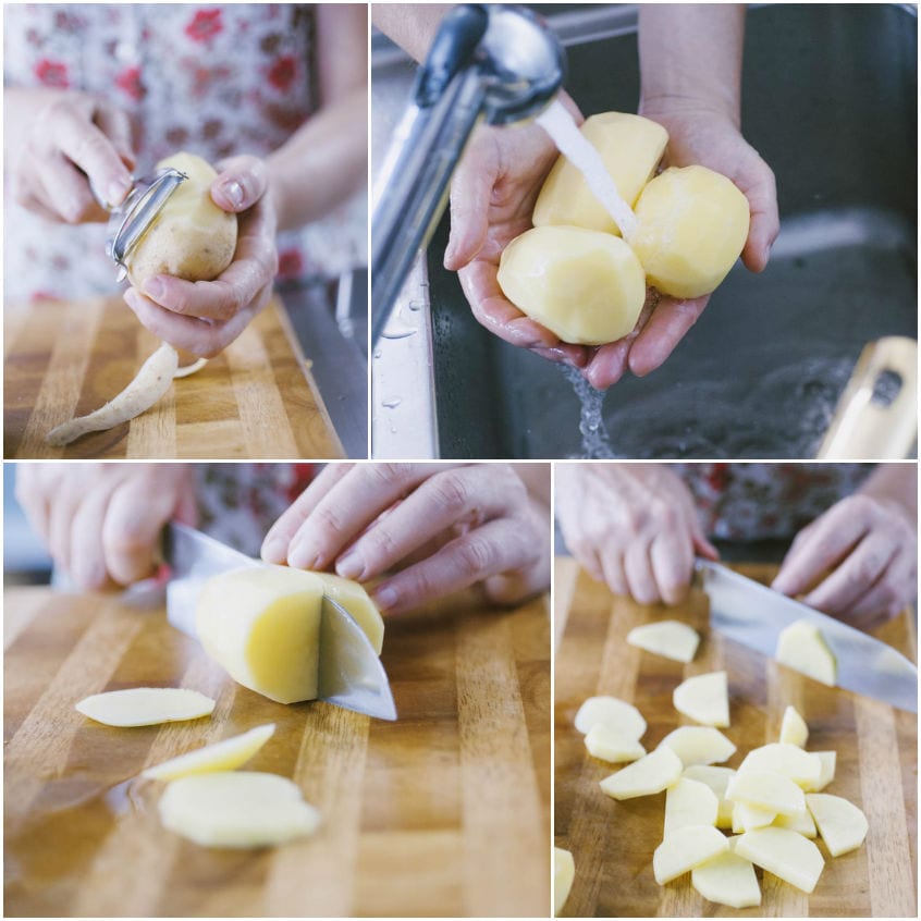 Patate pelate, sciacquate e affettate a fette sottili sul tagliere