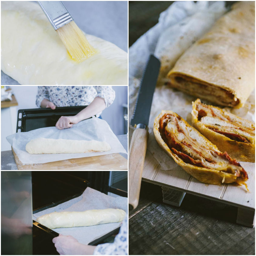 Rotolo di pizza spennellato con olio prima di essere infornato su carta forno