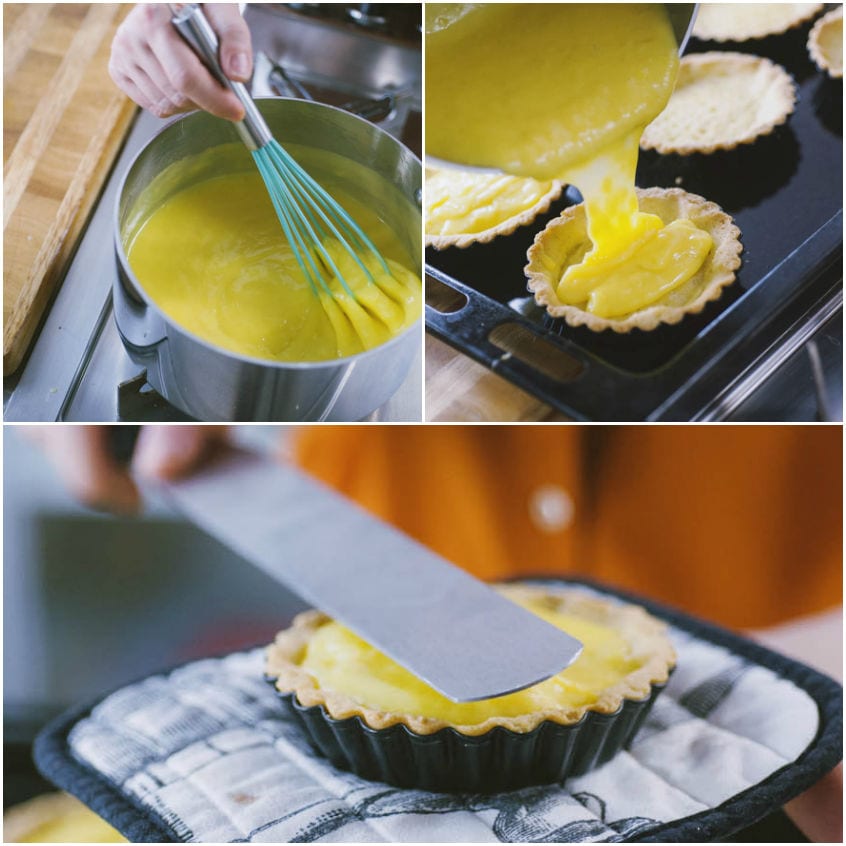 Crema al limone mescolata in pentola, versata nelle tortine e livellata con una spatola