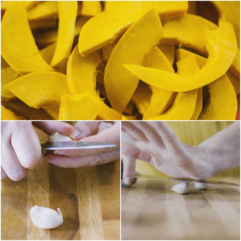 Spicchi di zucca tagliati e due spicchi d'aglio schiacciati con la lama del coltello