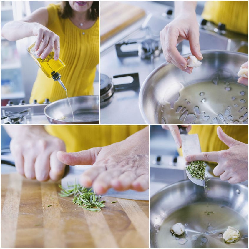 Olio versato in padella con aglio e rosmarino tritato finemente sul tagliere