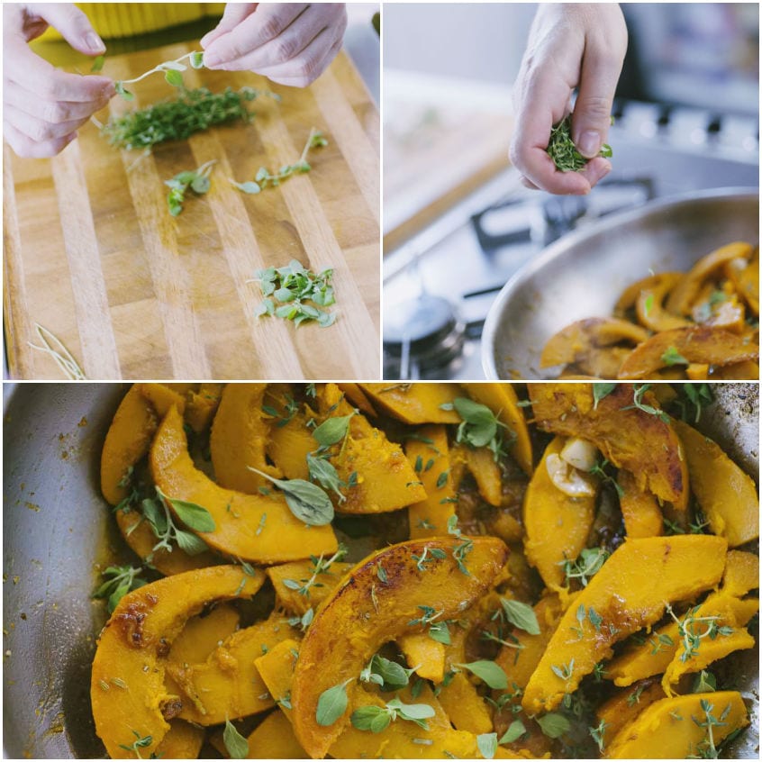 Mani che aggiungono erbe aromatiche fresche sulle fette di zucca saltata in padella