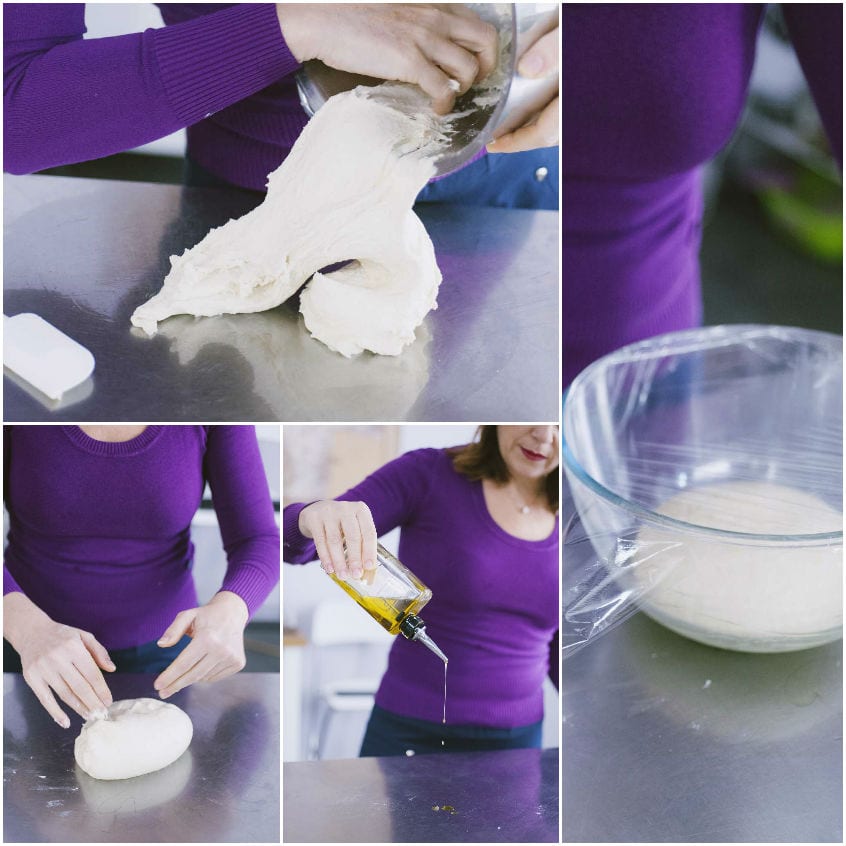 Impasto per pizzette lavorato a mano, unto con olio e coperto con pellicola per la lievitazione