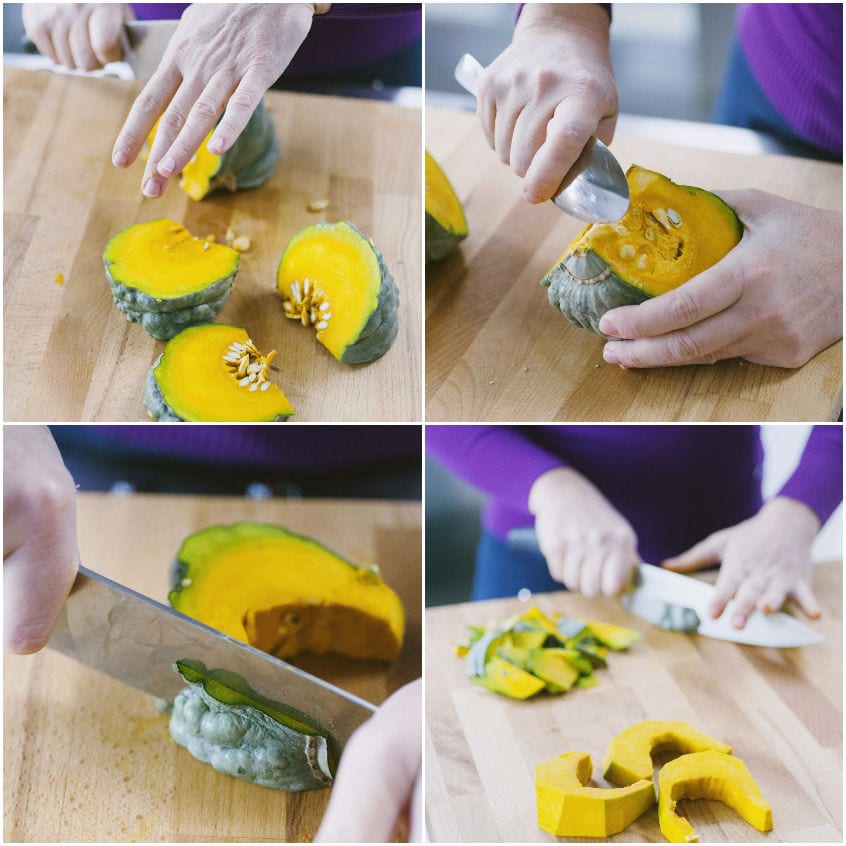 Zucca tagliata a spicchi, privata dei semi e della scorza a coltello sul tagliere