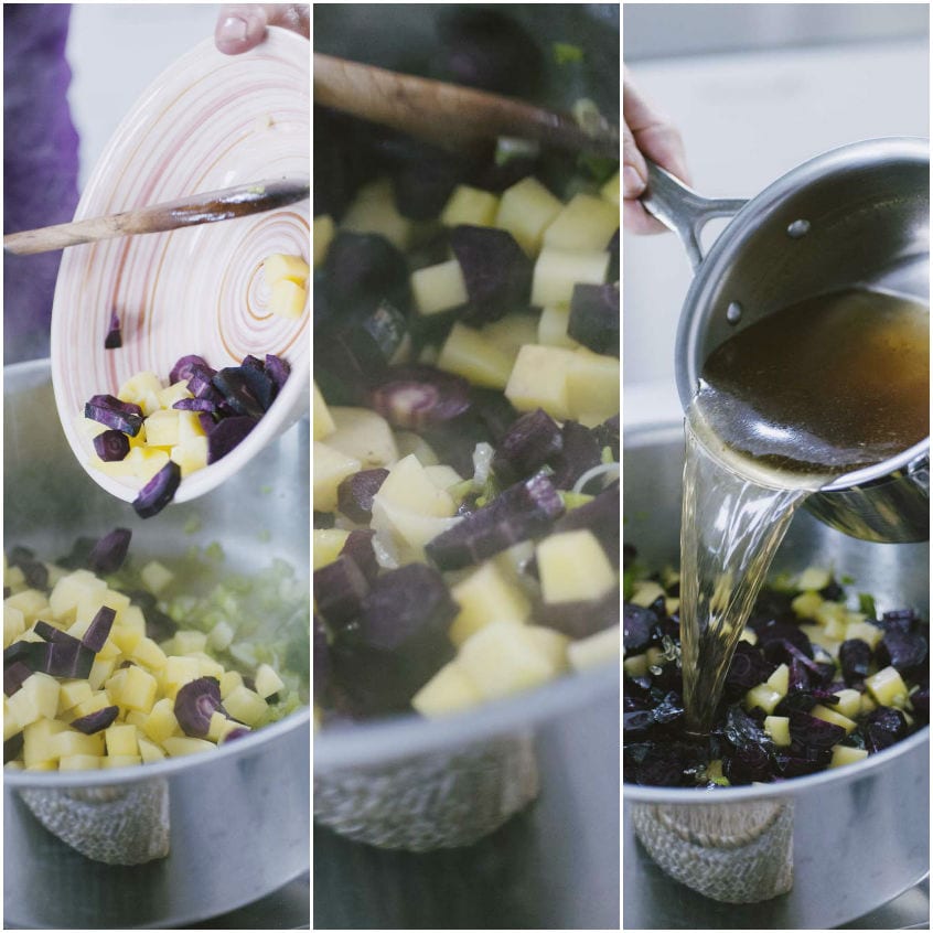 Patate e carote viola a cubetti aggiunte al soffritto, poi irrorate con brodo caldo