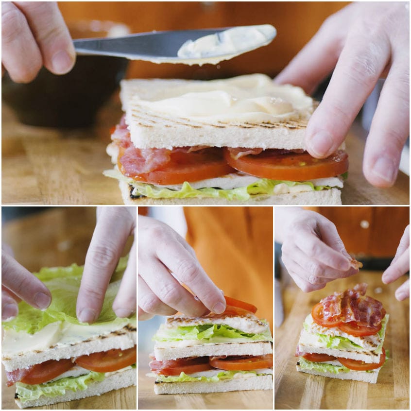 Farciture a strati di lattuga, pomodoro e bacon tra fette di pane per il clubhouse sandwich