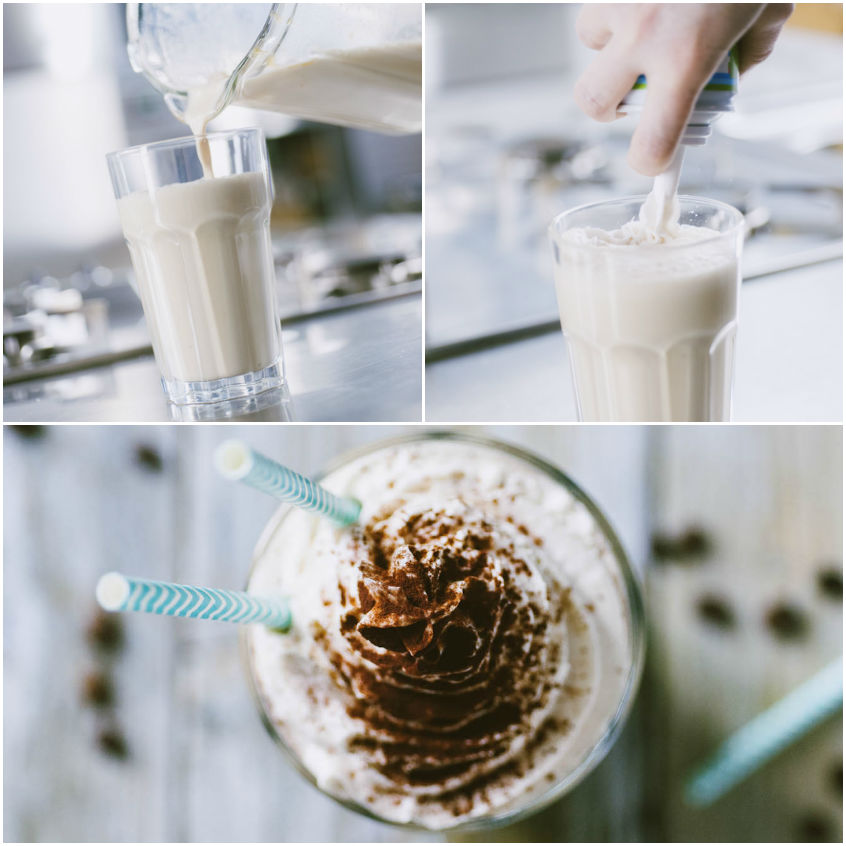 Frappè al cappuccino versato nel bicchiere, poi completato con panna montata e cacao in polvere