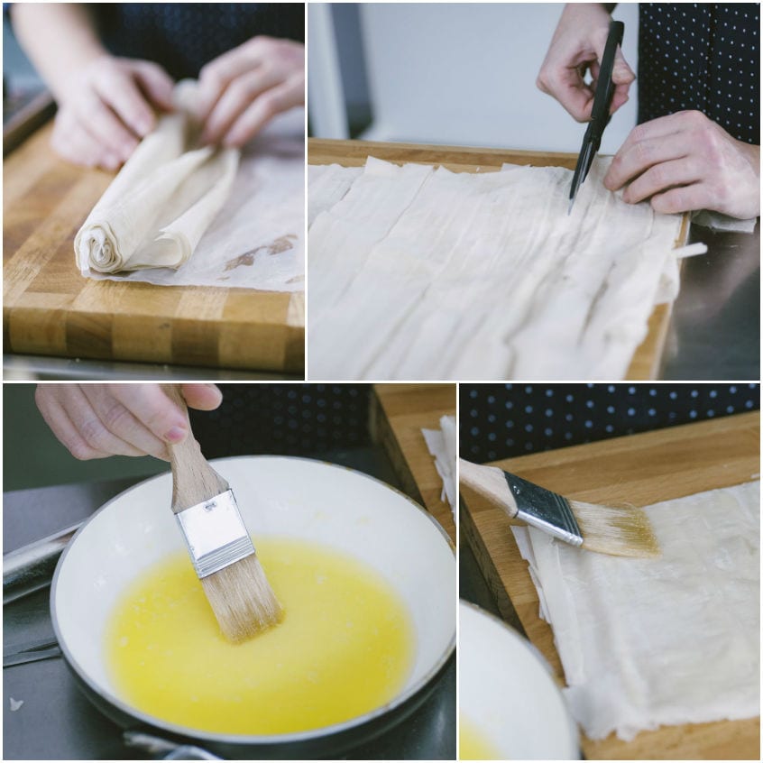 Pasta fillo arrotolata, tagliata a quadrati con le forbici e spennellata con burro fuso
