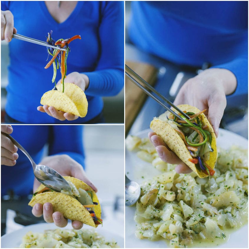 Farcitura di un taco con julienne di verdure colorate e stoccafisso a pezzetti