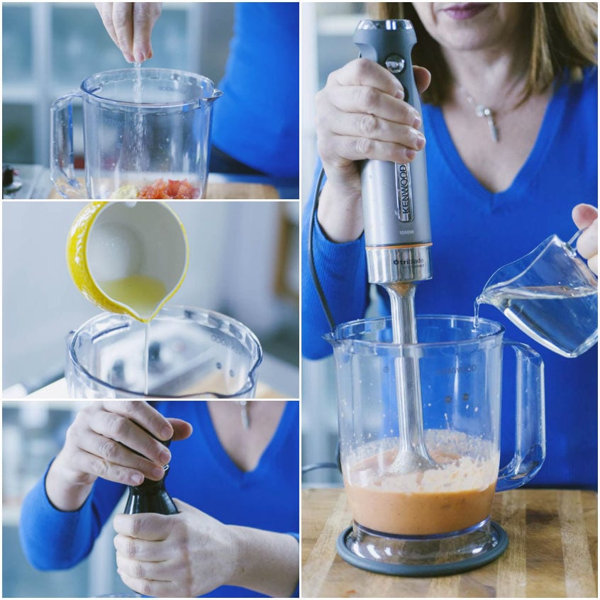 Frullatore a immersione amalgama pomodoro e uova mentre si versa olio a filo per la maionese