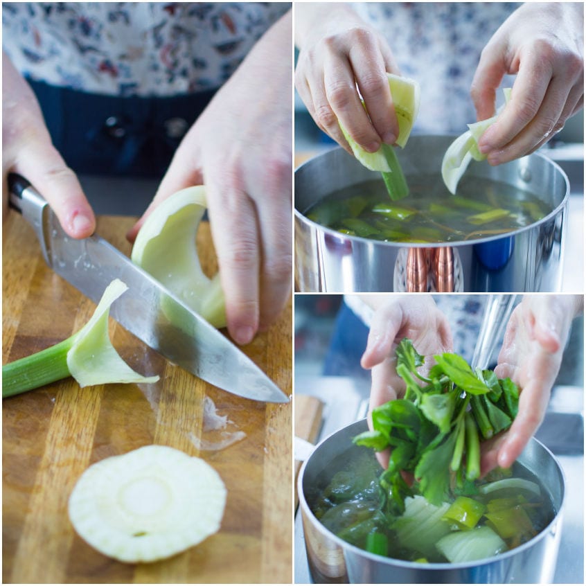 Verdure e scarti di finocchio immersi in pentola per preparare il brodo vegetale