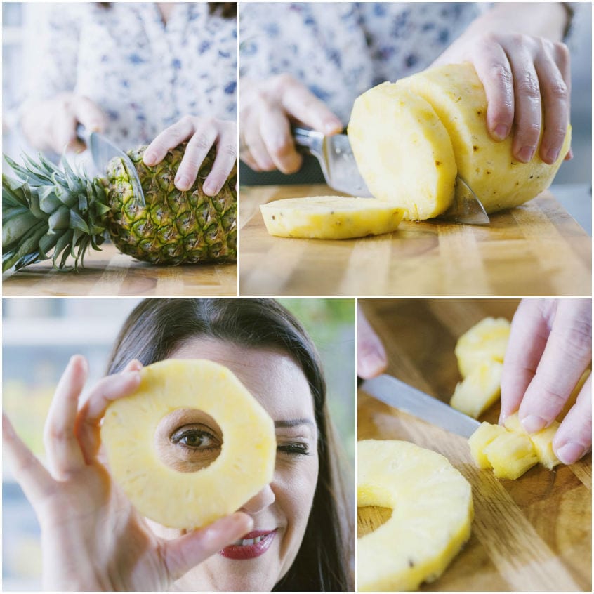 Ananas sbucciato e tagliato a fette con il torsolo rimosso sul tagliere
