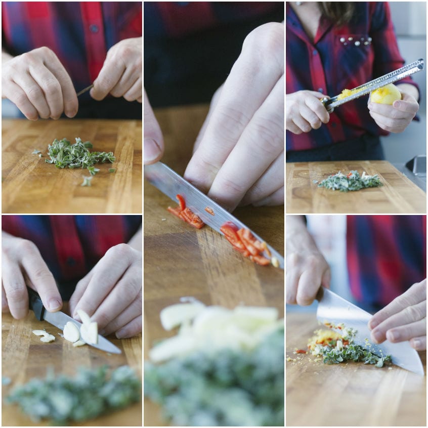 Mani che tritano erbe aromatiche, aglio e peperoncino, poi grattugiano scorza di limone sul tagliere