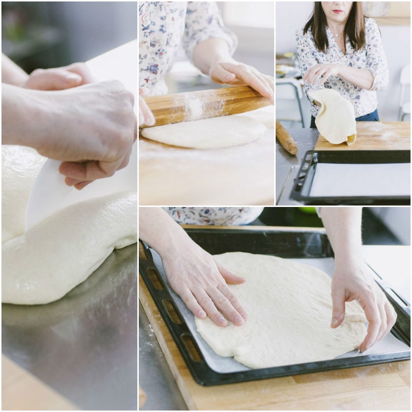 Disco di impasto per calzone steso sottile e adagiato su carta forno