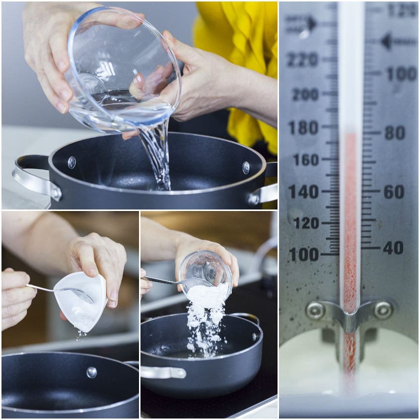 Acqua versata in padella, poi polvere bianca aggiunta con un cucchiaio e termometro da cucina a lato
