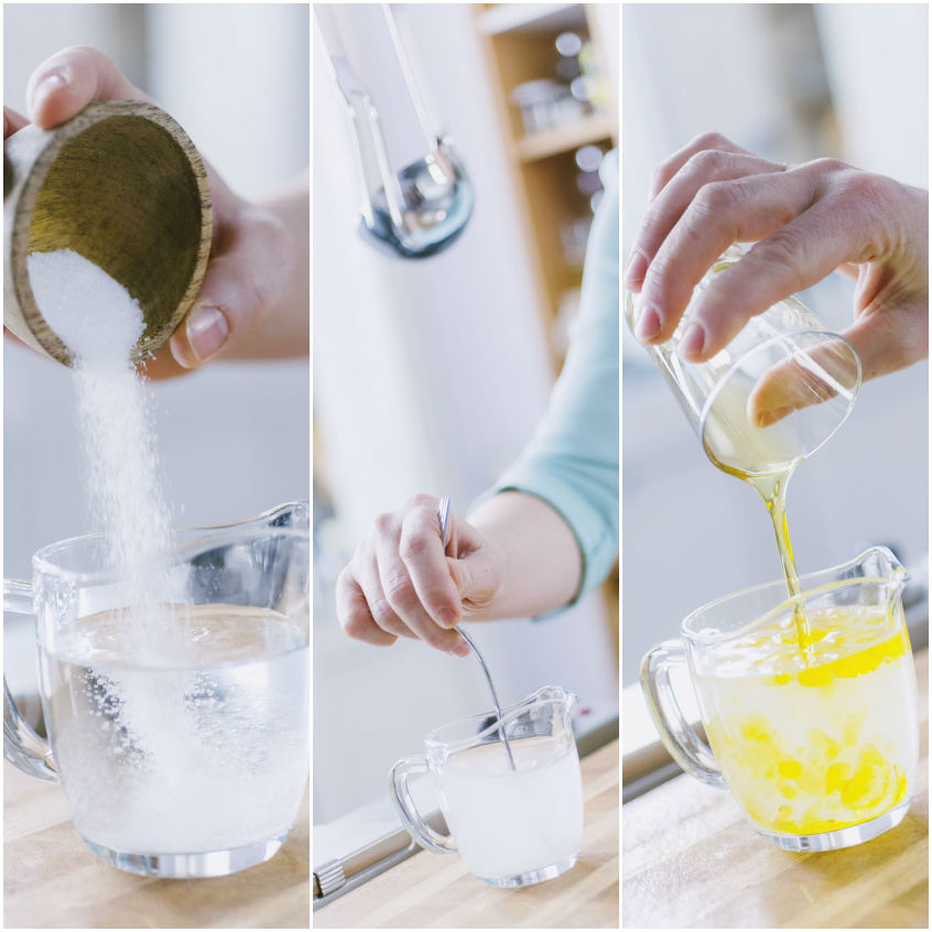 Zucchero versato in acqua, mescolato e poi emulsionato con olio in una caraffa