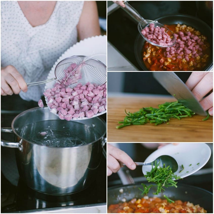 Gnocchetti di barbabietola scolati e versati nel sugo con pomodoro, mentre la salicornia viene tritata e aggiunta in padella