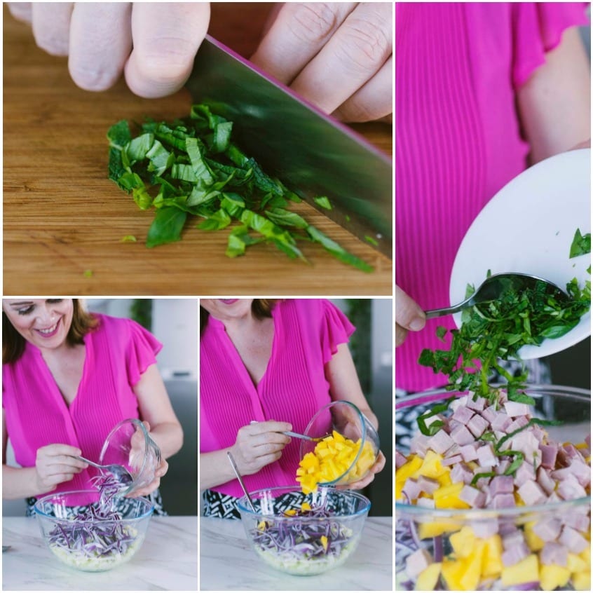 Basilico tritato sul tagliere e ingredienti uniti nella ciotola: mango, prosciutto e erbe aromatiche