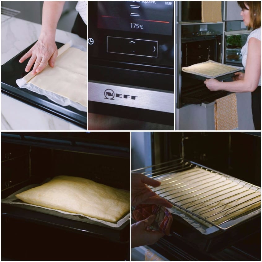Pasta sfoglia stesa su carta forno, infornata e appiattita con una griglia durante la cottura