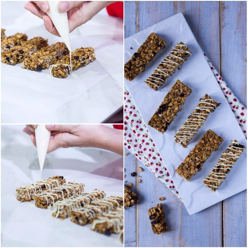 Mani che decorano barrette ai cereali con cioccolato bianco a filo usando un conetto