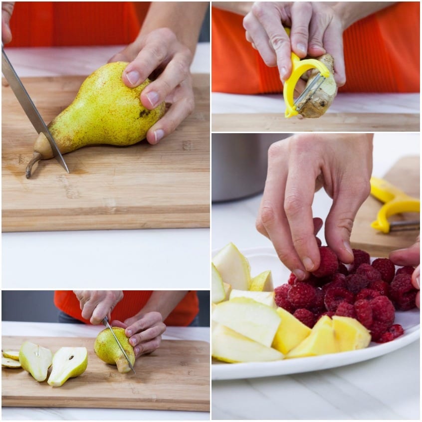 Pera tagliata a tocchetti, zenzero pelato e lamponi freschi pronti per il succo