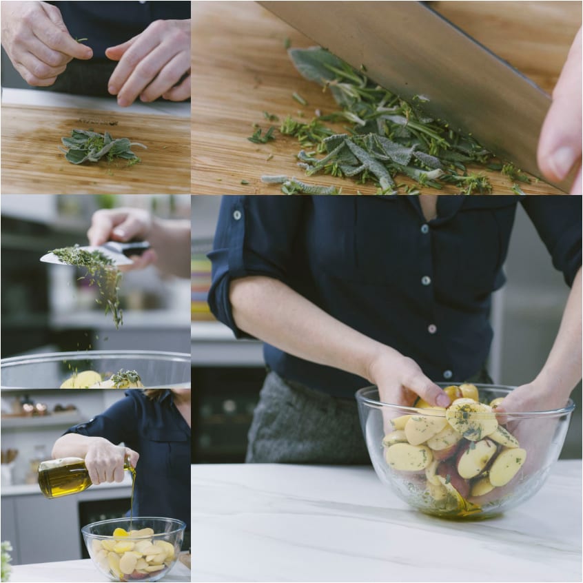 Erbe aromatiche tritate sul tagliere, poi aggiunte alle patate con un filo d'olio extravergine