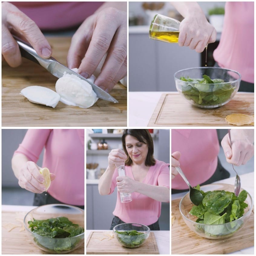 Mozzarella affettata sul tagliere e spinaci freschi conditi con olio, limone e sale