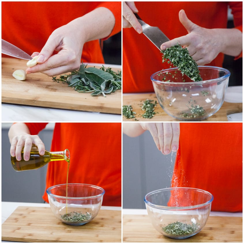 Aglio e erbe aromatiche tritati mescolati con olio extravergine e sale in una ciotola